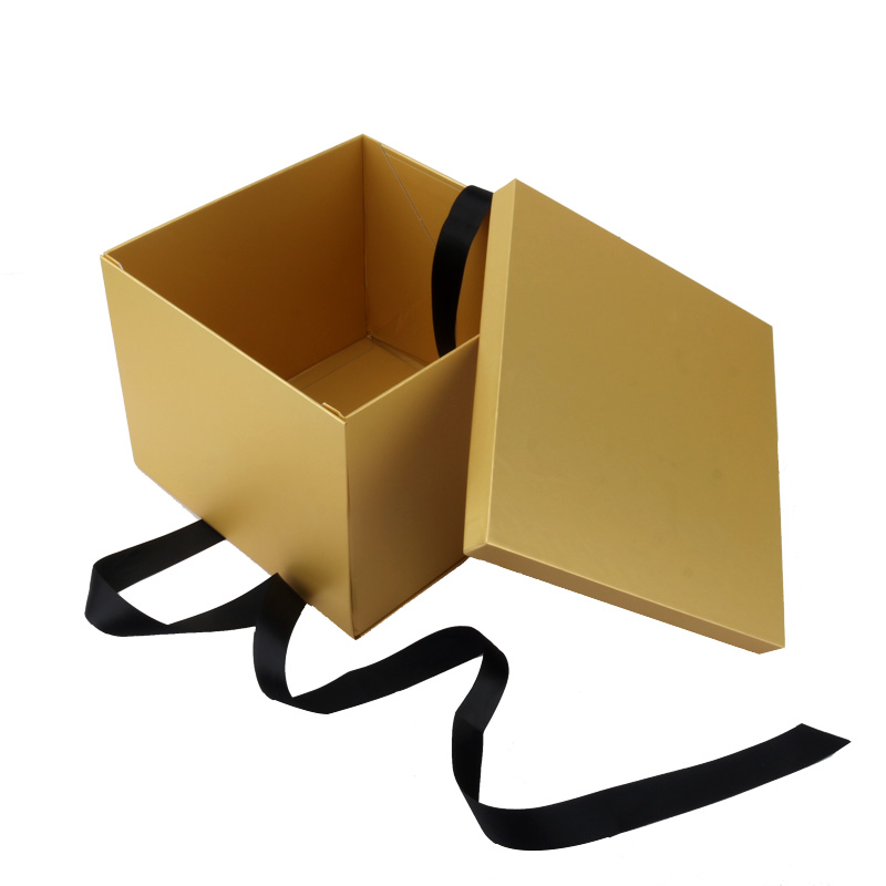 Black ribbon gold gift box